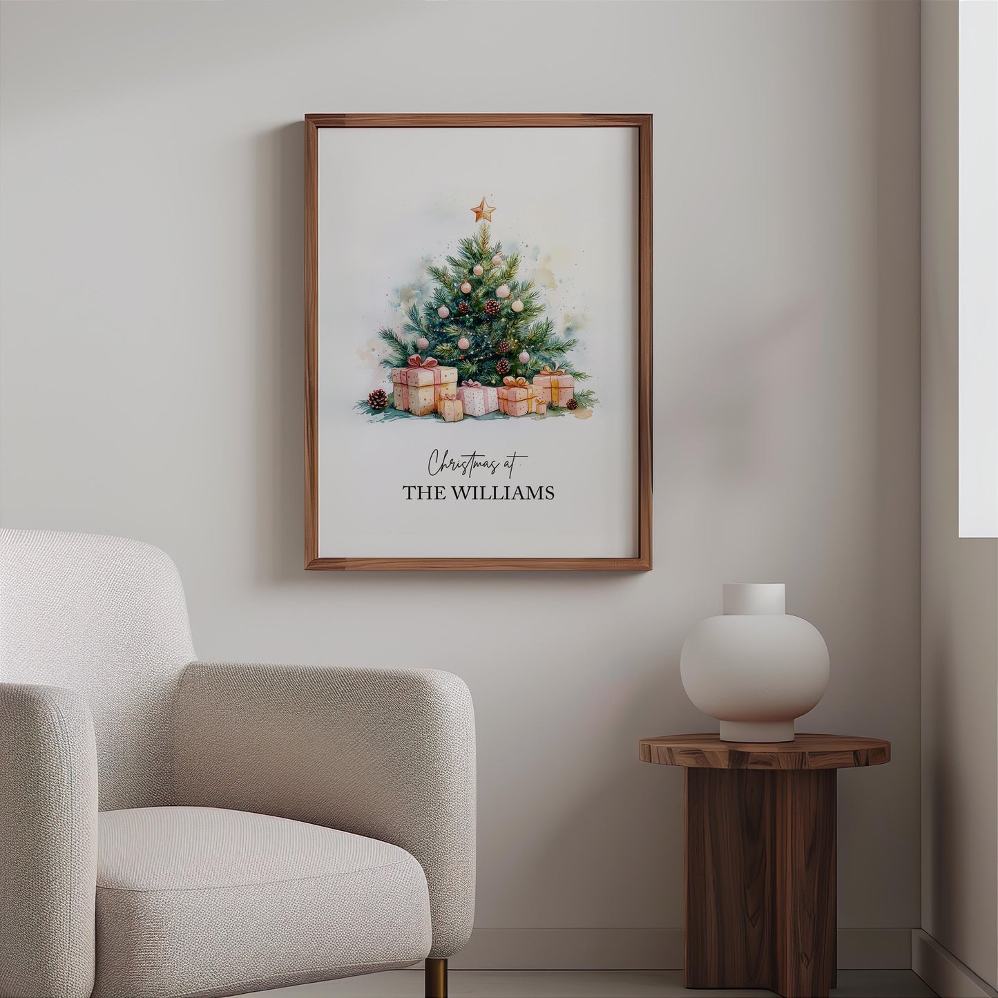 Watercolour Christmas tree decorated with gold star, pinecones, and pink baubles surrounded by wrapped gifts in soft festive tones. Customisable family name text reads “Christmas at The Jacksons.” Elegant personalised holiday wall art perfect for festive home décor or a thoughtful family Christmas gift. Printed to order on premium satin paper by Hues & Reflections UK.