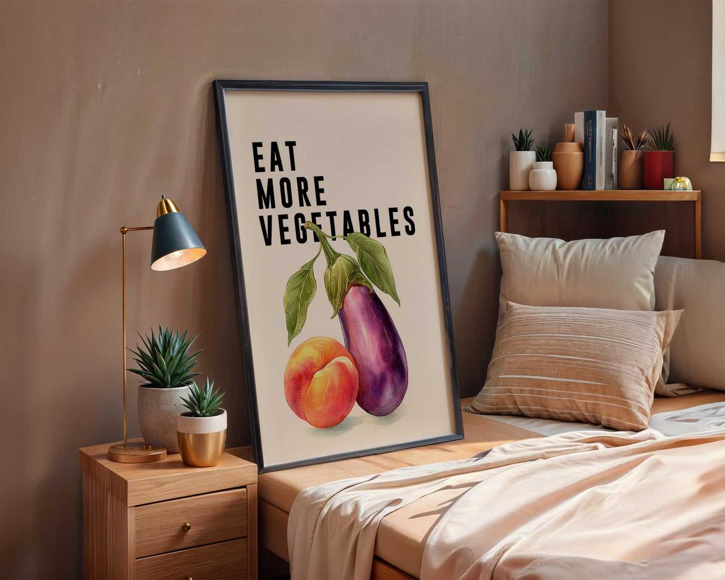 Playful food-themed wall art featuring bold black typography reading “Eat More Vegetable” above a colourful illustration of an aubergine and peach. Modern humorous kitchen poster with a cheeky twist, perfect for kitchens, dining rooms, or as a fun gift for friends. Printed to order on premium satin photo paper by Hues & Reflections UK.
