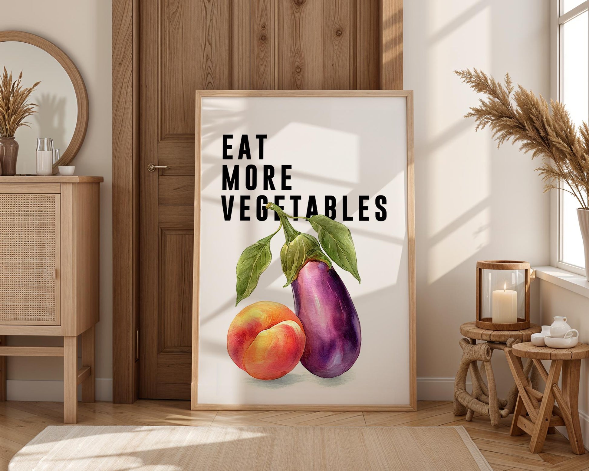 Playful food-themed wall art featuring bold black typography reading “Eat More Vegetable” above a colourful illustration of an aubergine and peach. Modern humorous kitchen poster with a cheeky twist, perfect for kitchens, dining rooms, or as a fun gift for friends. Printed to order on premium satin photo paper by Hues & Reflections UK.