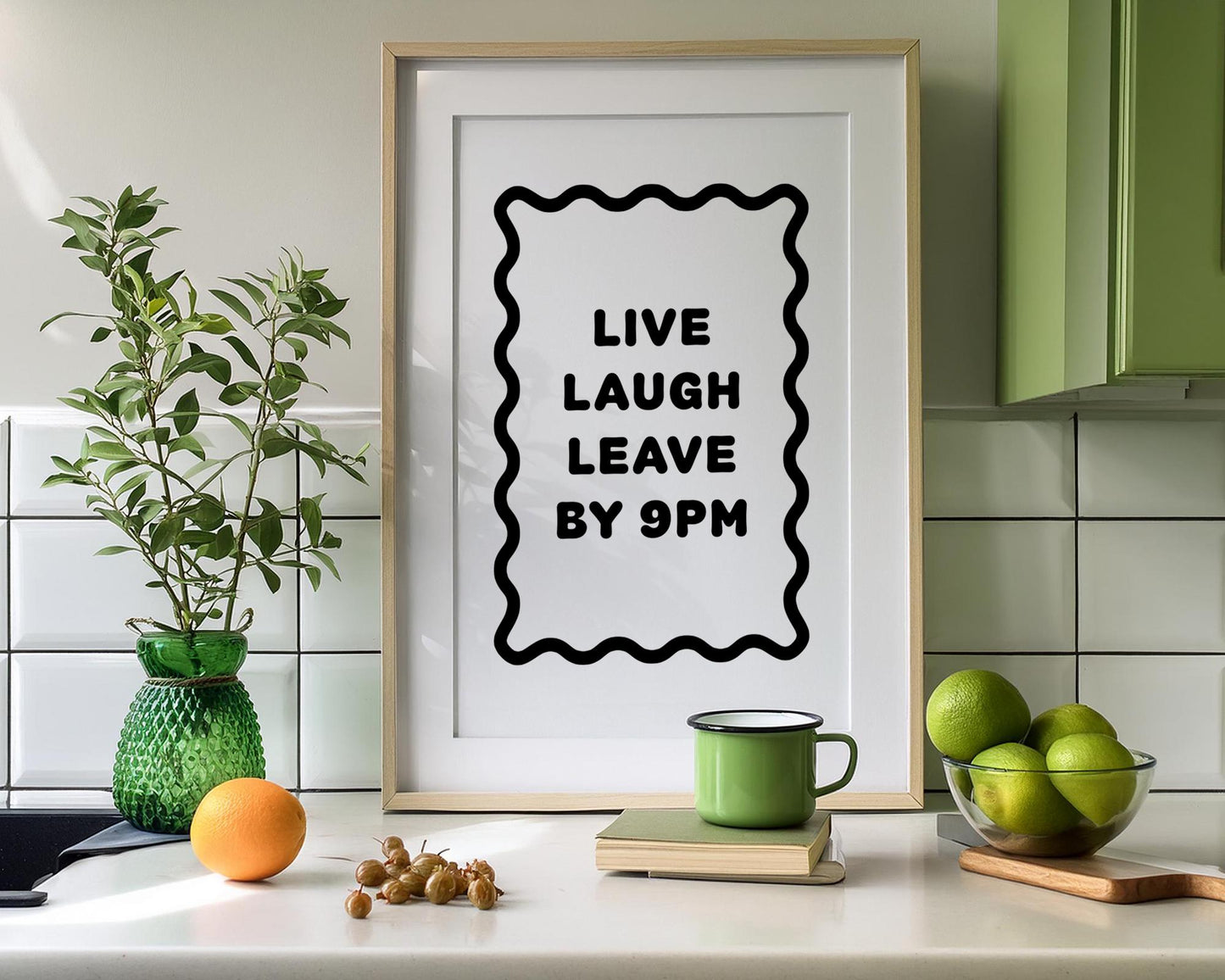 Bold black and white typography poster featuring the phrase “Live Laugh Leave By 9pm” framed by a wavy border. Minimalist modern design perfect for living rooms, hallways, or home offices. Funny quote wall art ideal for introverts, humour lovers, or as a witty gift for friends. Printed on premium satin paper, made in the UK by Hues & Reflections.