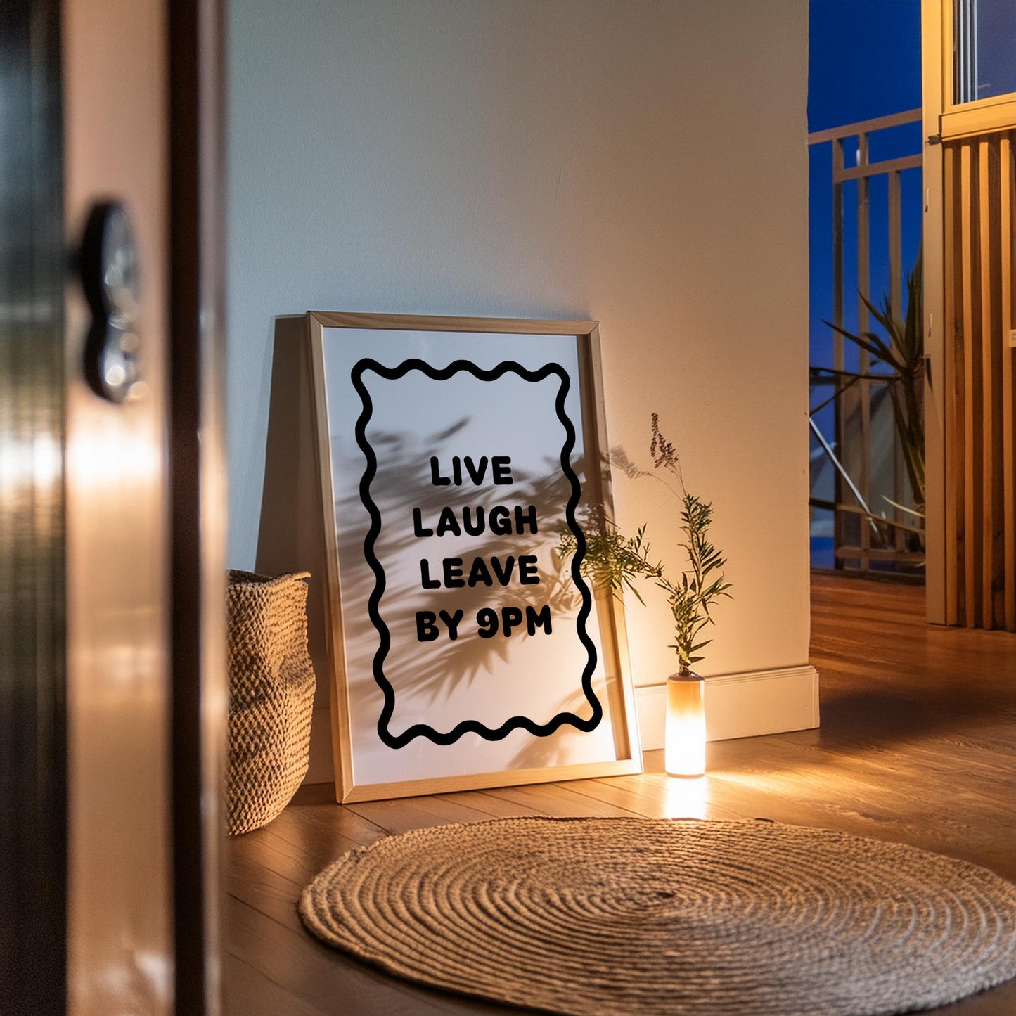 Bold black and white typography poster featuring the phrase “Live Laugh Leave By 9pm” framed by a wavy border. Minimalist modern design perfect for living rooms, hallways, or home offices. Funny quote wall art ideal for introverts, humour lovers, or as a witty gift for friends. Printed on premium satin paper, made in the UK by Hues & Reflections.