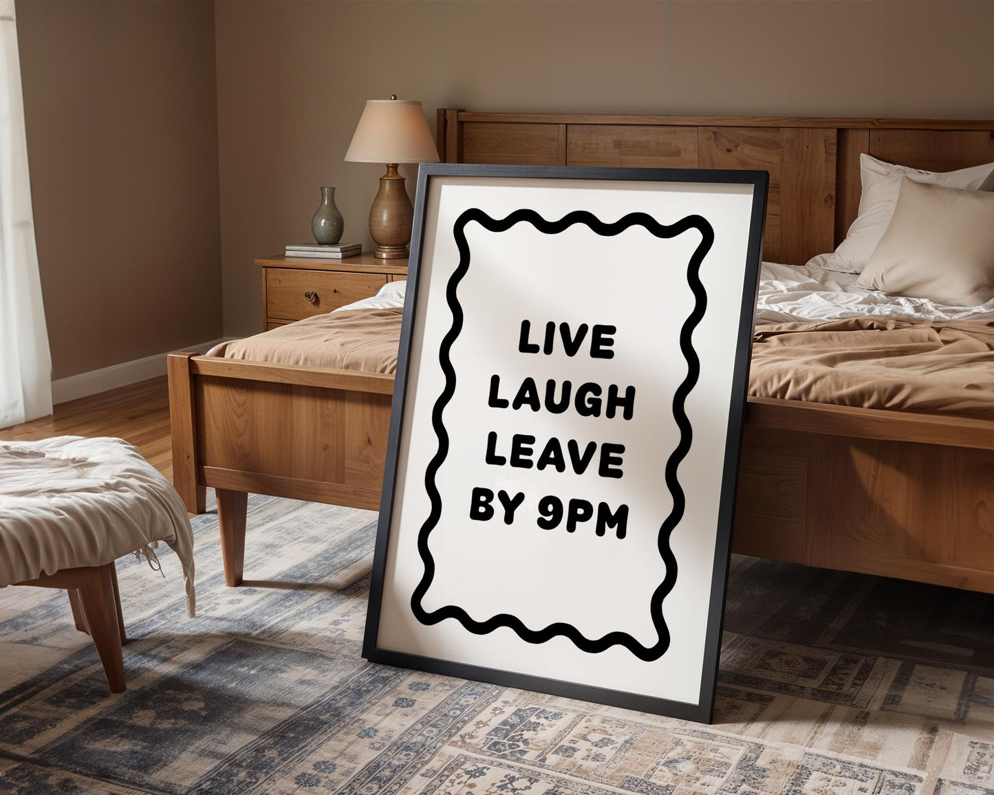 Bold black and white typography poster featuring the phrase “Live Laugh Leave By 9pm” framed by a wavy border. Minimalist modern design perfect for living rooms, hallways, or home offices. Funny quote wall art ideal for introverts, humour lovers, or as a witty gift for friends. Printed on premium satin paper, made in the UK by Hues & Reflections.