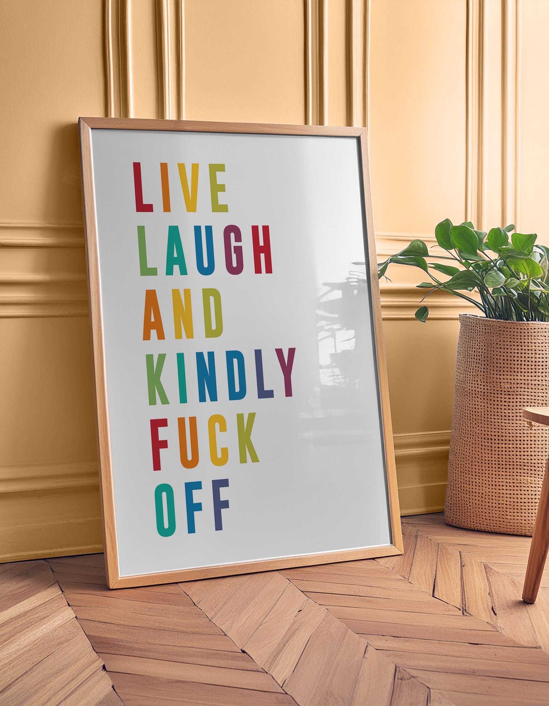 Colourful modern typography poster with the phrase “Live Laugh and Kindly F*** Off” in bold rainbow letters on a white background. Bright, funny quote wall art perfect for bedrooms, living rooms, or offices. A cheeky, contemporary gift for friends with a sense of humour. Printed to order on premium satin photo paper by Hues & Reflections UK.