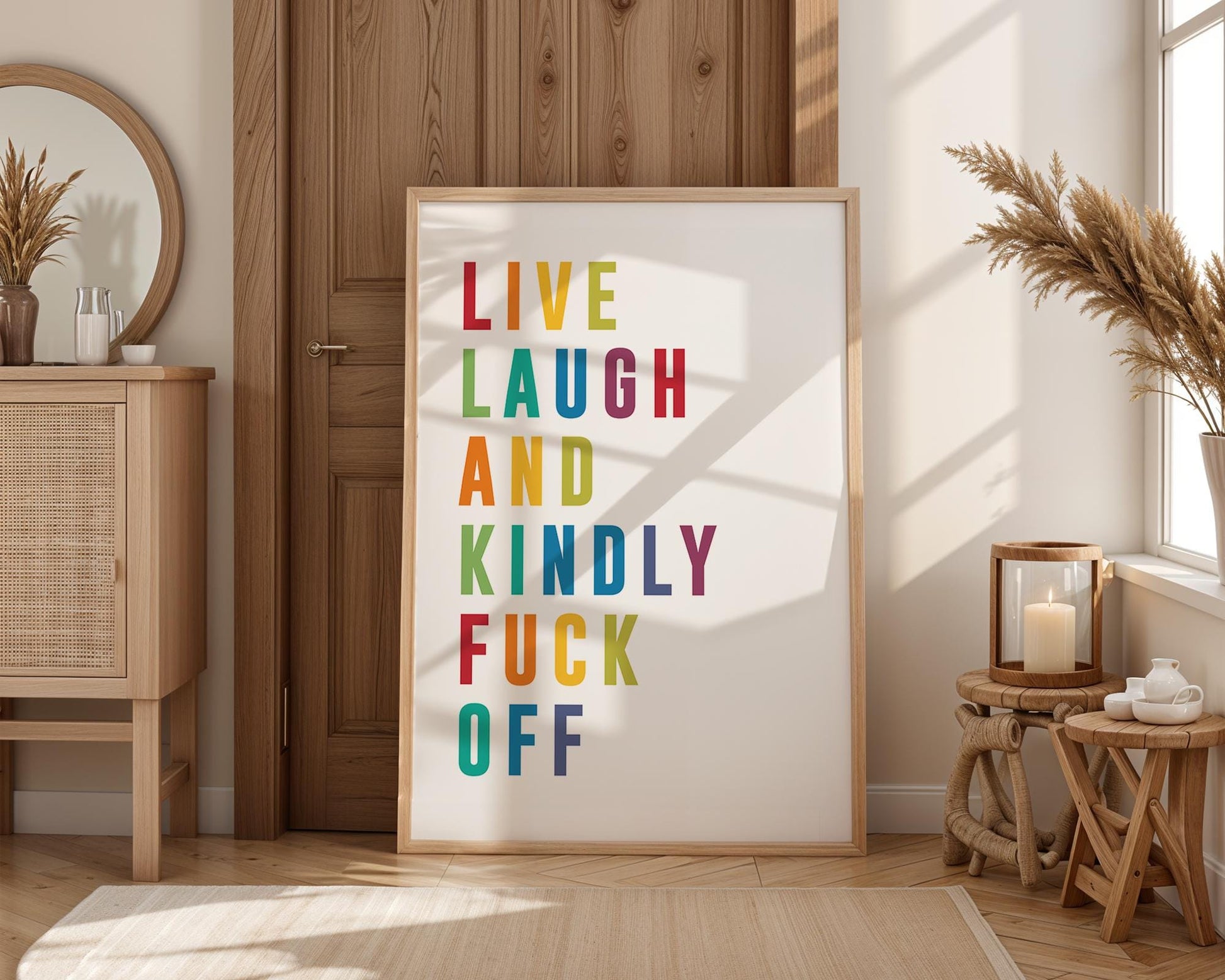 Colourful modern typography poster with the phrase “Live Laugh and Kindly F*** Off” in bold rainbow letters on a white background. Bright, funny quote wall art perfect for bedrooms, living rooms, or offices. A cheeky, contemporary gift for friends with a sense of humour. Printed to order on premium satin photo paper by Hues & Reflections UK.