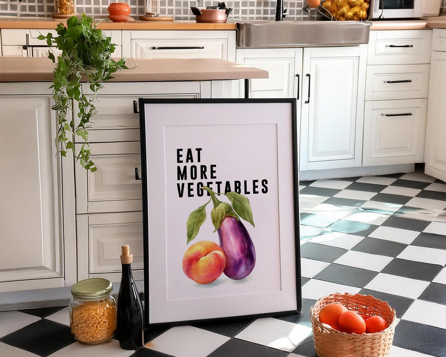 Playful food-themed wall art featuring bold black typography reading “Eat More Vegetable” above a colourful illustration of an aubergine and peach. Modern humorous kitchen poster with a cheeky twist, perfect for kitchens, dining rooms, or as a fun gift for friends. Printed to order on premium satin photo paper by Hues & Reflections UK.