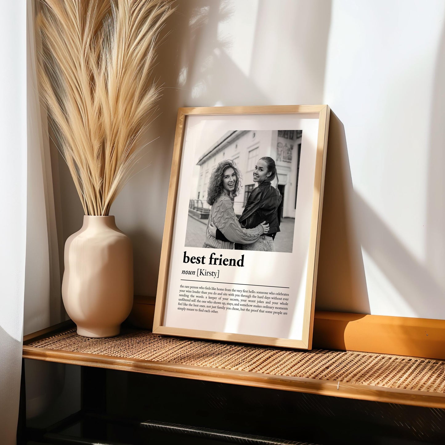 Personalised best friend definition print in a wooden frame, showing a photo of two friends above a dictionary-style best friend definition, custom bestie keepsake gift made in the UK.
