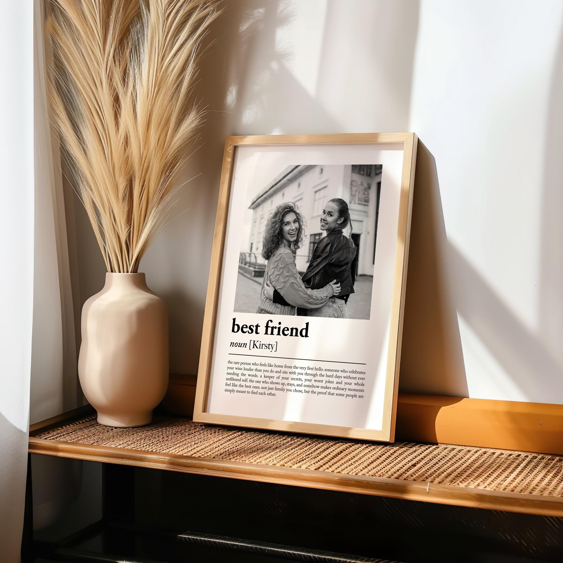 Personalised best friend definition print in a wooden frame, showing a photo of two friends above a dictionary-style best friend definition, custom bestie keepsake gift made in the UK.