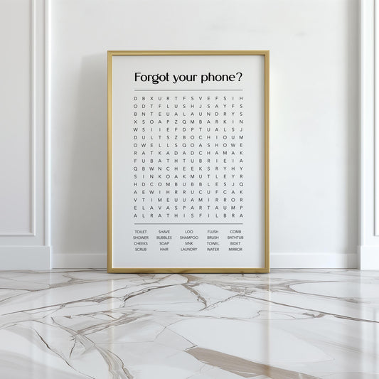 Funny bathroom word search print with the title Forgot Your Phone, modern typographic puzzle wall art featuring hidden bathroom themed words including shower bubbles bidet flush and comb, quirky toilet humour poster available in 8 colours including beige black and white blonde claret forest indigo lobster and olive, perfect for guest bathrooms powder rooms and as a housewarming gift, printed on premium 260gsm satin lustre paper, handmade in the UK by Hues and Reflections small business