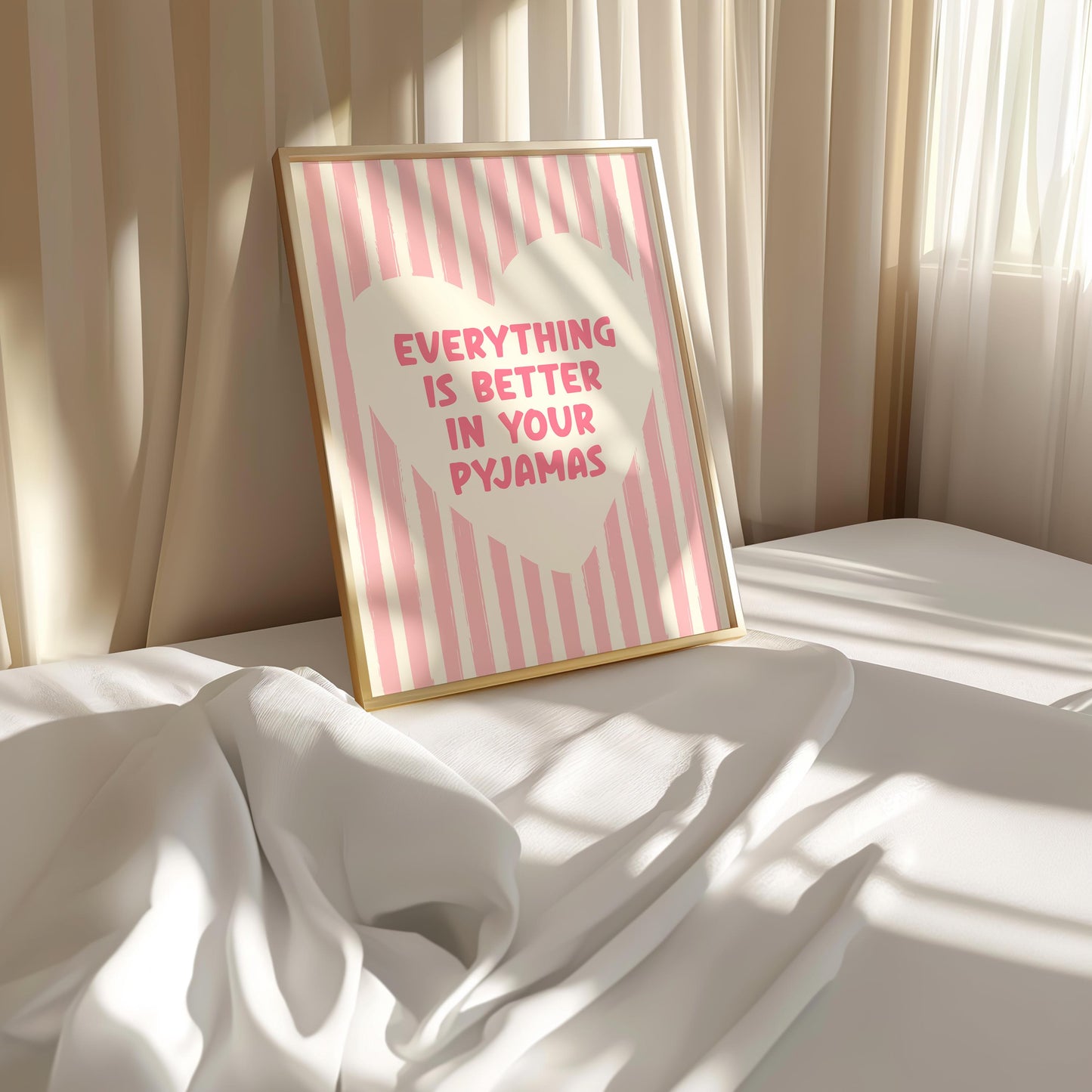 Everything Is Better In Your Pyjamas print, funny pink bedroom wall art featuring a chunky hand drawn quote inside a cream heart on a pink hand painted stripe background, cute cosy bedroom decor poster for above the bed dressing rooms walk in wardrobes and girly interior schemes, perfect thoughtful gift for best friends sisters bridesmaids hen dos Galentines Mother's Day and housewarming, printed on premium 260gsm satin lustre paper, handmade in the UK by Hues and Reflections small business