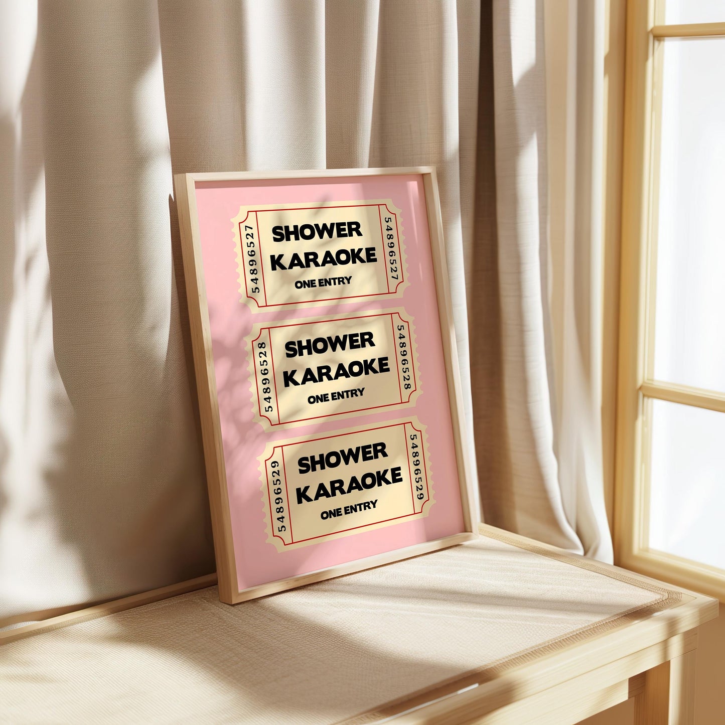 Shower Karaoke ticket print, funny pink bathroom wall art featuring a stack of three retro vintage style cream tickets with bold black typography reading Shower Karaoke One Entry on a soft blush pink background, trendy aesthetic poster for main bathrooms en-suites guest powder rooms and teen bathrooms, perfect housewarming and hen do gift for shower singers everywhere, printed on premium 260gsm satin lustre paper, handmade in the UK by Hues and Reflections small business