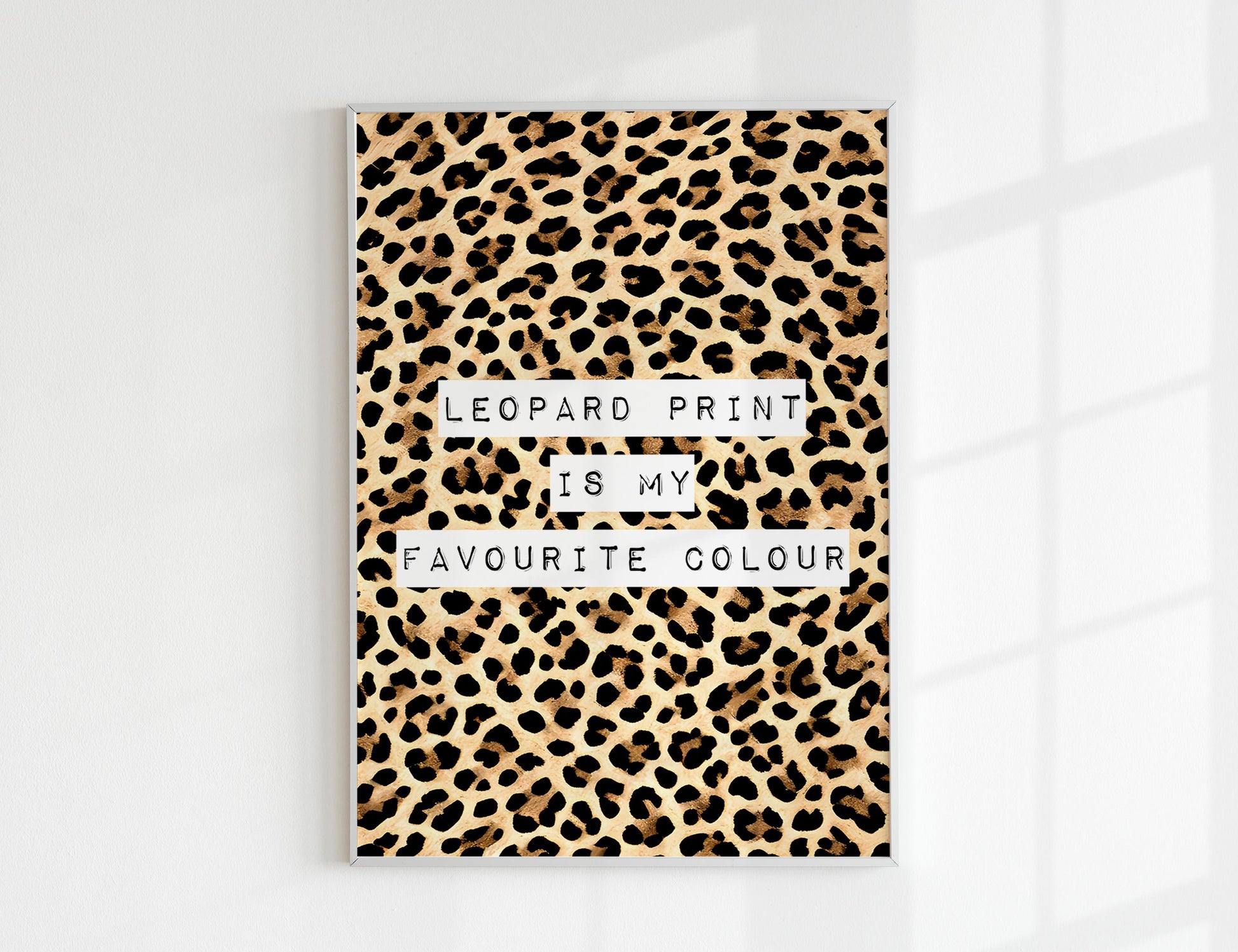 Leopard Print Is My Favourite Colour print, funny fashion quote wall art featuring a classic leopard animal print background with magazine cutout typewriter style text, trendy poster for dressing rooms walk in wardrobes bedrooms vanity corners and home offices, perfect gift for fashion lovers stylists Carrie Bradshaw fans best friends sisters and Galentines, pairs with maximalist eclectic and fashion led interiors, printed on premium 260gsm satin lustre paper