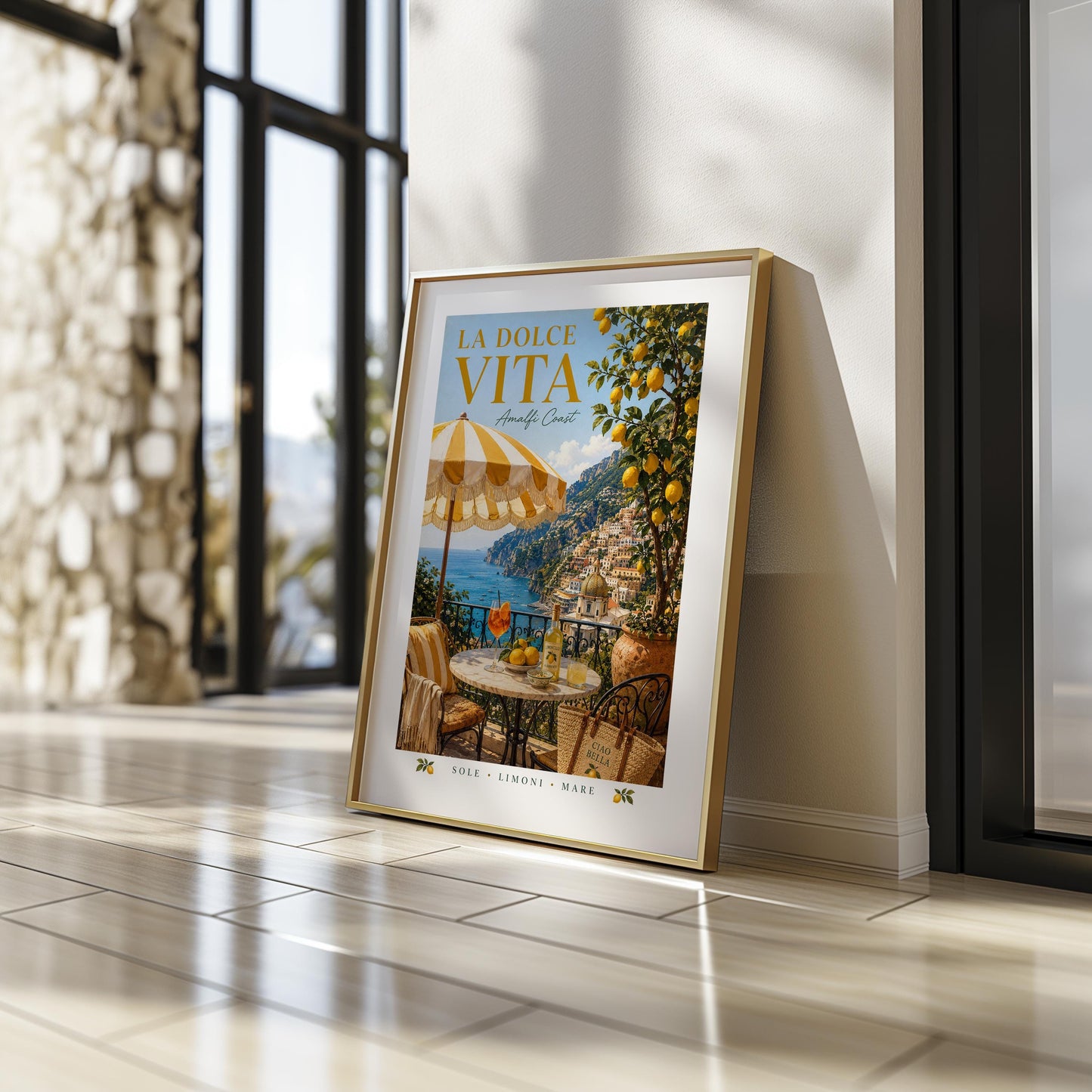 La Dolce Vita Amalfi Coast poster featuring a sunny Italian balcony with yellow and white striped umbrella, marble bistro table with Aperol spritz and Limoncello, lemon tree and view of Positano coastline, vintage Italian travel poster style wall art in warm golden palette, perfect Mediterranean print for kitchens dining rooms and Italy lovers, printed on premium 260gsm satin lustre paper, handmade in the UK by Hues and Reflections small business