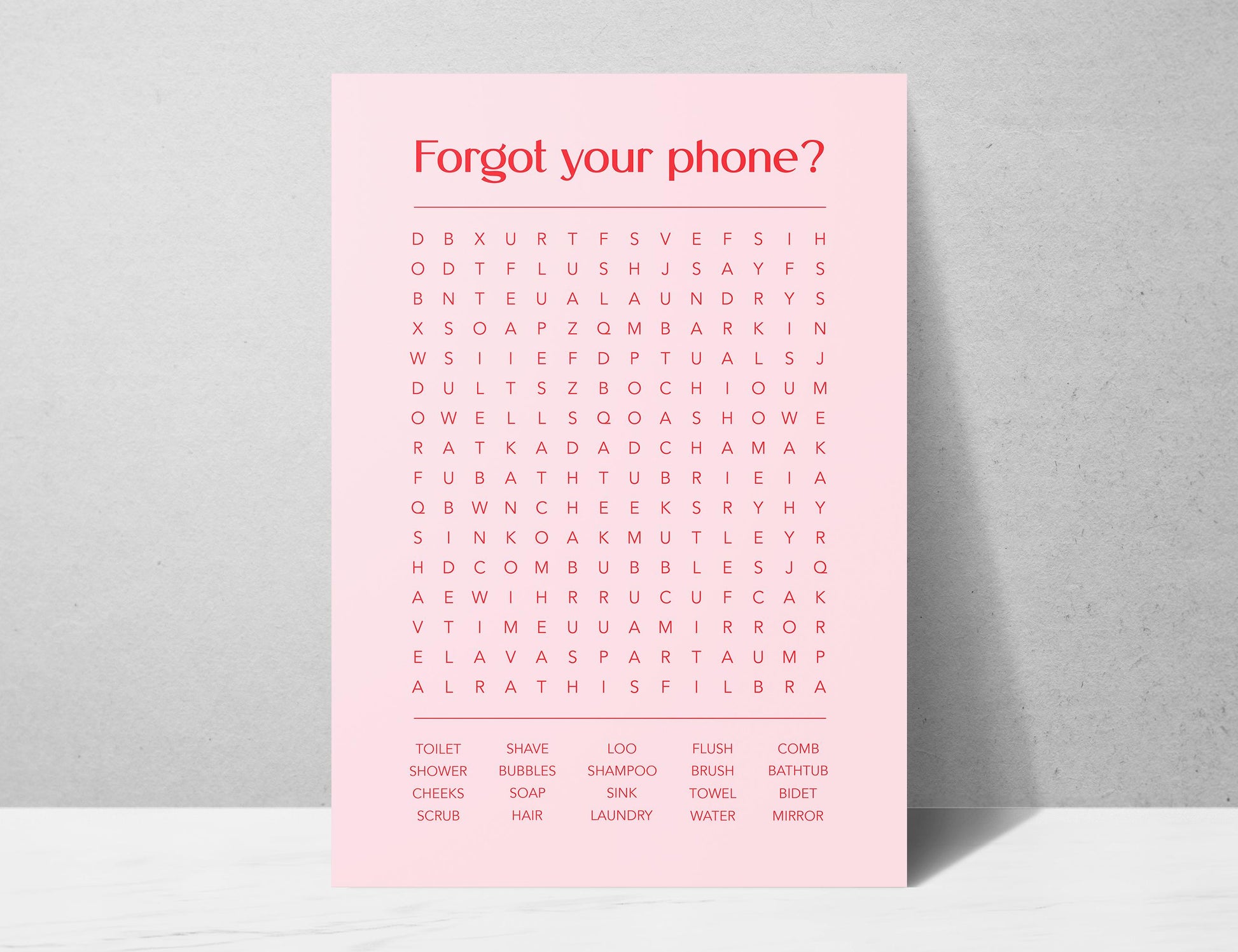 Funny bathroom word search print with the title Forgot Your Phone, modern typographic puzzle wall art featuring hidden bathroom themed words including shower bubbles bidet flush and comb, quirky toilet humour poster available in 8 colours including beige black and white blonde claret forest indigo lobster and olive, perfect for guest bathrooms powder rooms and as a housewarming gift, printed on premium 260gsm satin lustre paper, handmade in the UK by Hues and Reflections small business